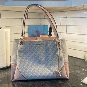 Michael Kors, pink and gold.